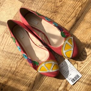 Pink flats decorated with bright fruit detail